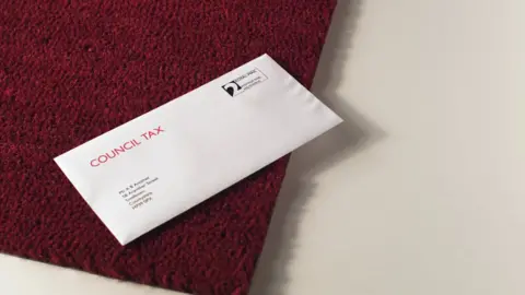 BBC Council tax letter on a red mat
