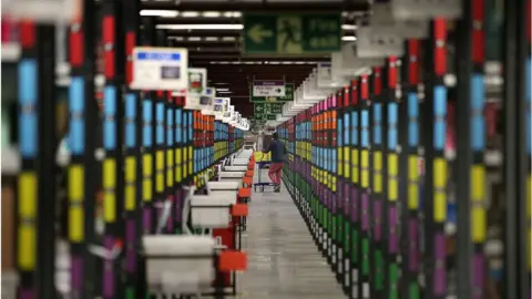 Getty Images Amazon worker in warehouse