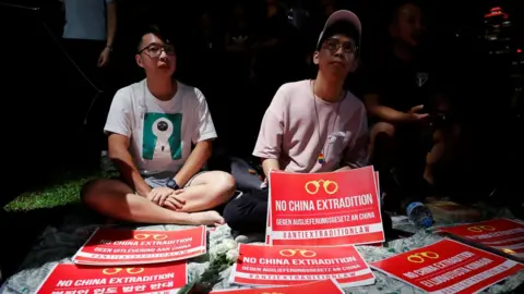 Reuters Demonstrators protest to demand authorities scrap a proposed extradition bill with China, in Hong Kong