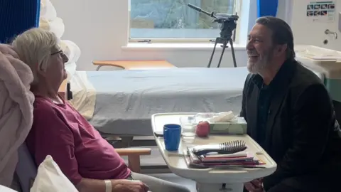 stroke patient Penny Donavan with actor Ciaran Hinds