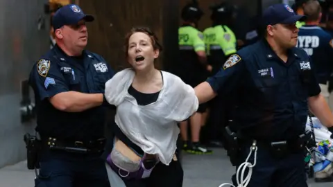 Getty Images Protester being arrested
