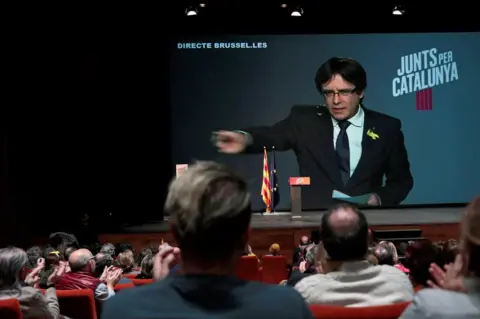 EPA Carles Puigdemont addresses his party in Barcelona in a video conference from Brussels, 12 December