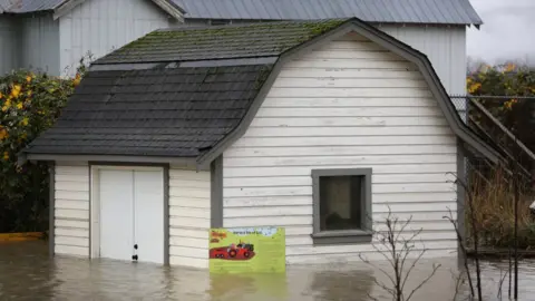 Getty Images Abbotsford Community Garden is seen in floodwater in Abbotsford, British Columbia on November 18, 2021