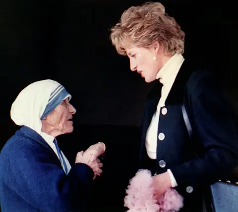 PA Diana, Princess of Wales meeting Mother Teresa during a visit to a convent in Rome in 1992