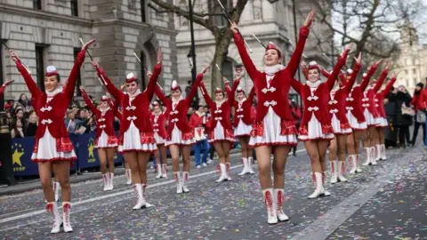 PA People take part in the London New Year's Day Parade