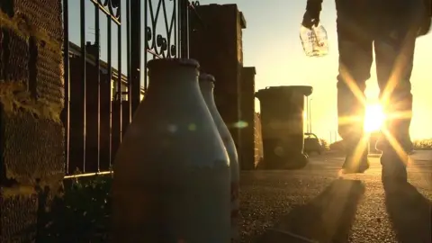 Milkman at dawn