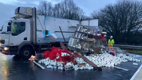 Highways England  Milk on the M5 after the lorry overturned