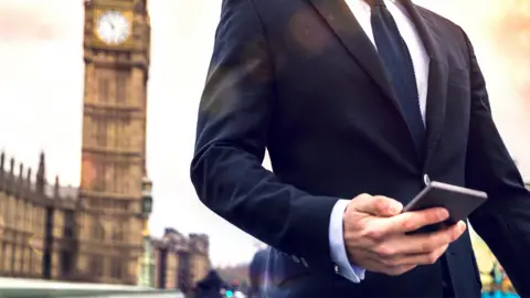 Getty Images Man with phone