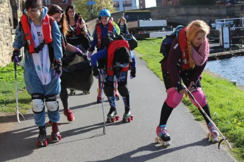 Canal And River Trust Roller derby players pick litter in Leeds