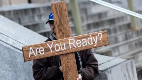 AFP Christians preach outside the Agriculture Department near the Reason Rally on the National on Mall March 24, 2012 in Washington, DC.