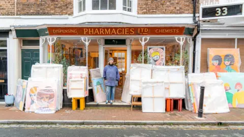 Helm Gallery/ Ashleigh Cosham The artist Margo in Margate outside her studio in Ramsgate