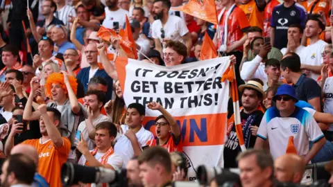 Getty Images Luton Town fans celebrate promotion