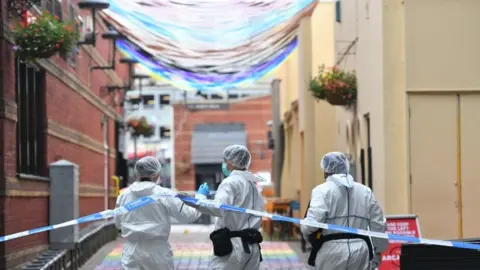 PA Media Forensic teams at the scene