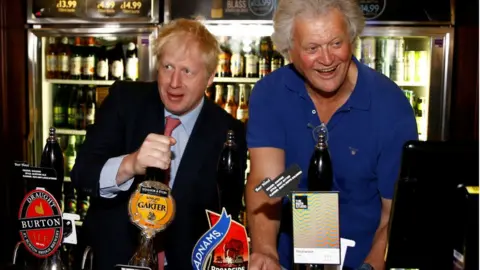 Getty Images Boris Johnson and Tim Martin at a Wetherspoon pub in July 2019