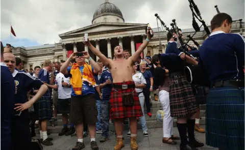 Getty Images Scotland fans at Trafalgar Square