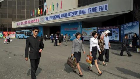 Getty Images North Korean visitors leave the the 13th International Trade Fair in Pyongyang on September 25, 2017