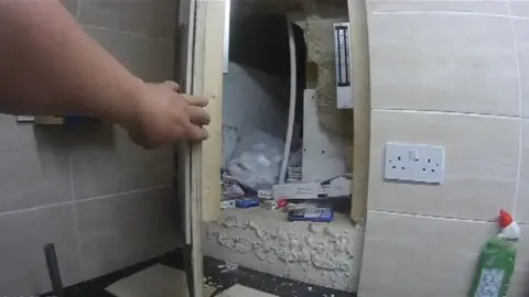 Oxfordshire Trading Standards A stash of illegal cigarettes in a secret partition