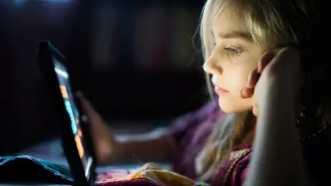 Getty Images  Girl on screen