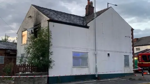 Greater Manchester Fire and Rescue Service Fire damaged building