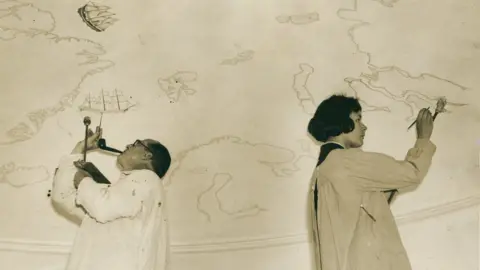 SPRI University of Cambridge Macdonald Gill and Priscilla Johnston painting one of the SPRI domes