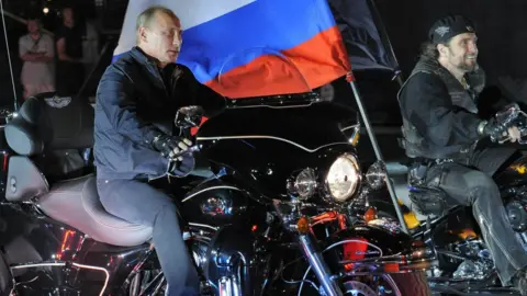 AFP Vladimir Putin at a motorcycle rally in 2011