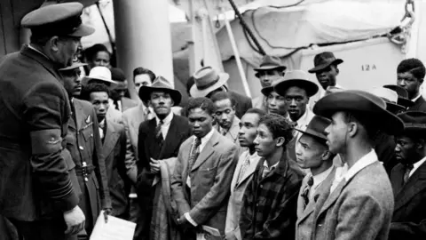 PA Media Immigrants aboard the HMT Empire Windrush