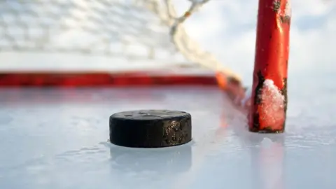 Getty Images Puck on ice