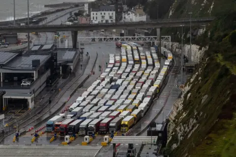 Getty Images Freight lorries queue at Dover docks as ferry crossings remain cancelled on November 2, 2023 in Dover, England.