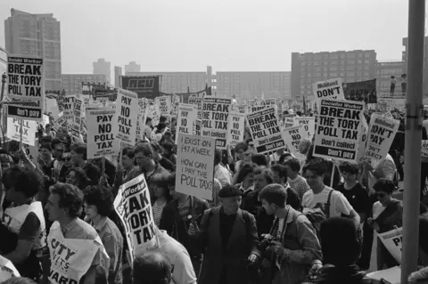 Getty Images Anti-poll tax protesters in March 1990