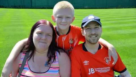 Luton Town Mat Westwood with his wife Lizzie and son Alfie