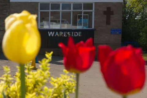 BBC Wareside exterior photograph shot through tulips