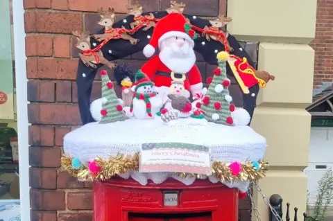 Asha Louise Rankine Christmas postbox topper in Woodville