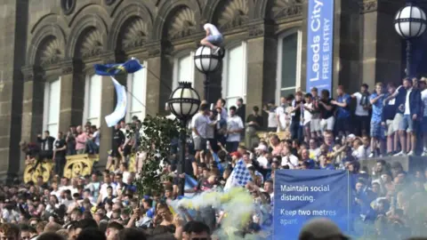 Getty Images Leeds fans in Millennium Square