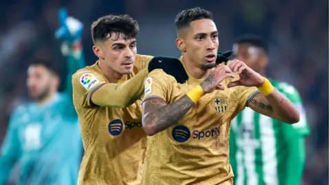 Pedri and Raphinha celebrate Barcelona's first goal