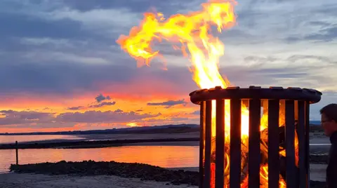 Lesley Mcclymont Lesley Mcclymont sent this image of a beacon pictured as the sun set at Irvine beach in Ayrshire