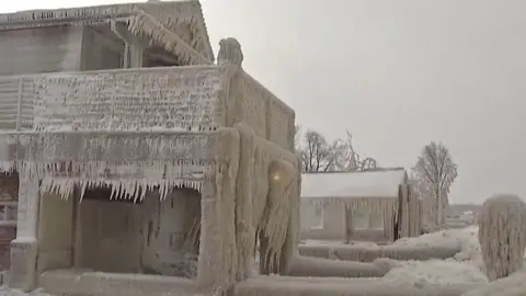 Icicles cover a house in New York state