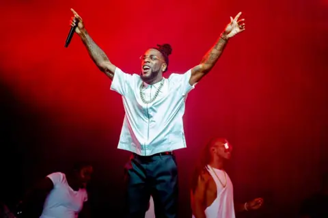 EPA The Nigerian singer Burna Boy performs during the Lowlands 2022 Festival.