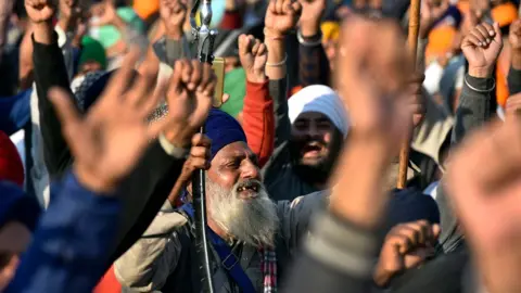 Getty Images Protestors on the border between Haryana and Delhi