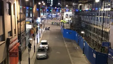 Police cordon off the area following the fatal stabbing