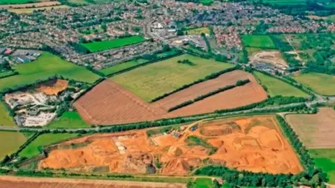 wickleshamquarry.com An aerial image of Wicklesham Quarry