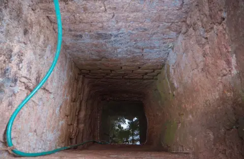 Neil D'Souza A dried up water well in Sonshi.