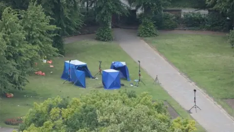 PA Media Blue tents erected for murder investigations in Forbury Gardens