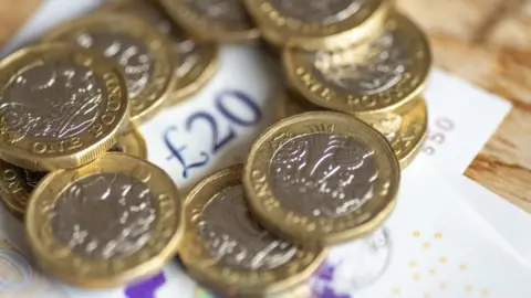 Pound coins and bank notes