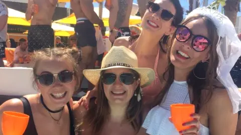 Carly Beasley/Brain Tumour Research) Carly on her Hen do in Ibiza with Katy and other friends