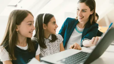 Getty Images Girls with laptop