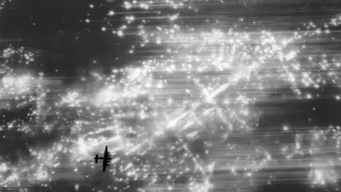 Getty Images Newspaper photo of a raid over Hamburg