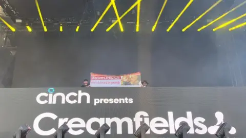 Ryan Millen Banner on stage at Creamfields