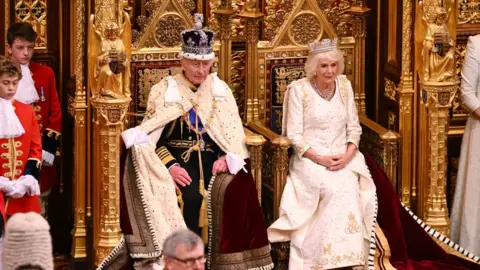PA Media King Charles III and Queen Camilla during the State Opening of Parliament