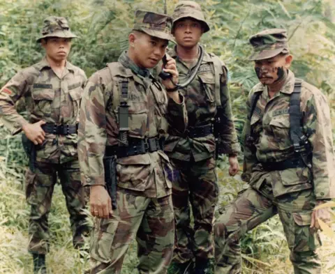 Prabowo Subianto/FB Prabowo Subianto and other men dressed in military uniform in East Timor in the late 1970s