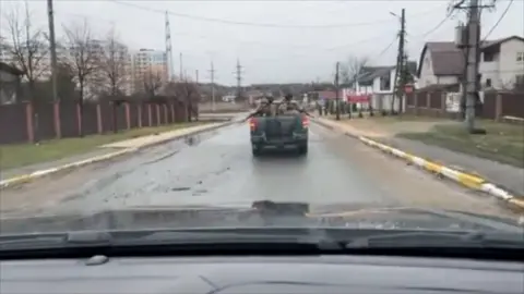 Snapshot of a video uploaded to Twitter of the Ukrainian town of Bucha